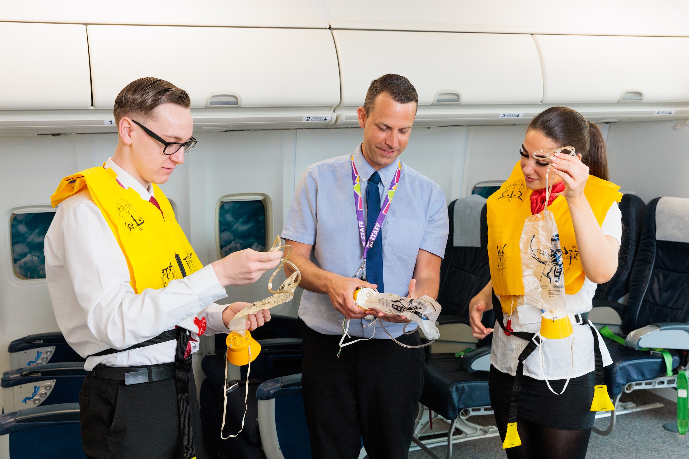 students and teacher in an aeroplane interior